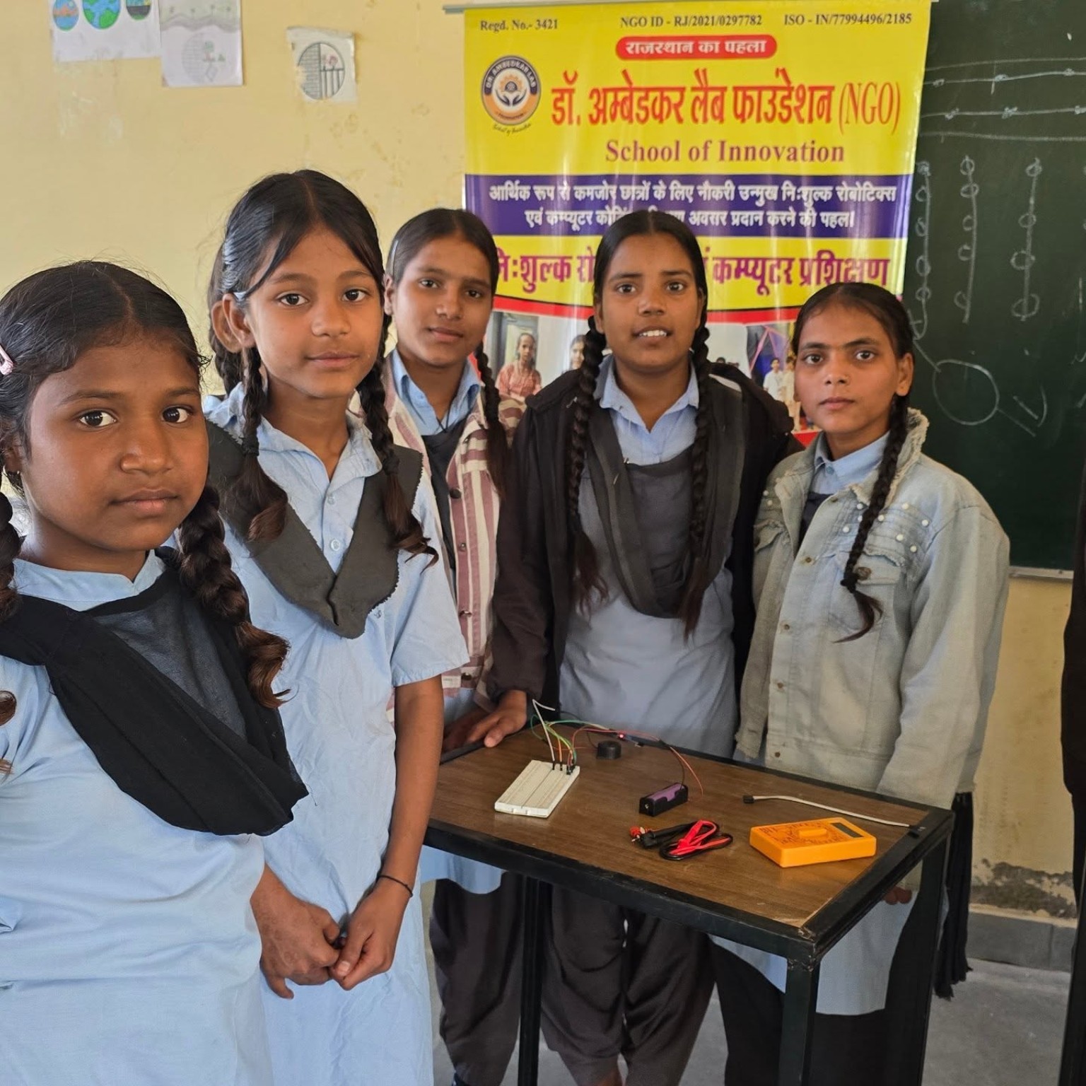 Students sharing an electronics project